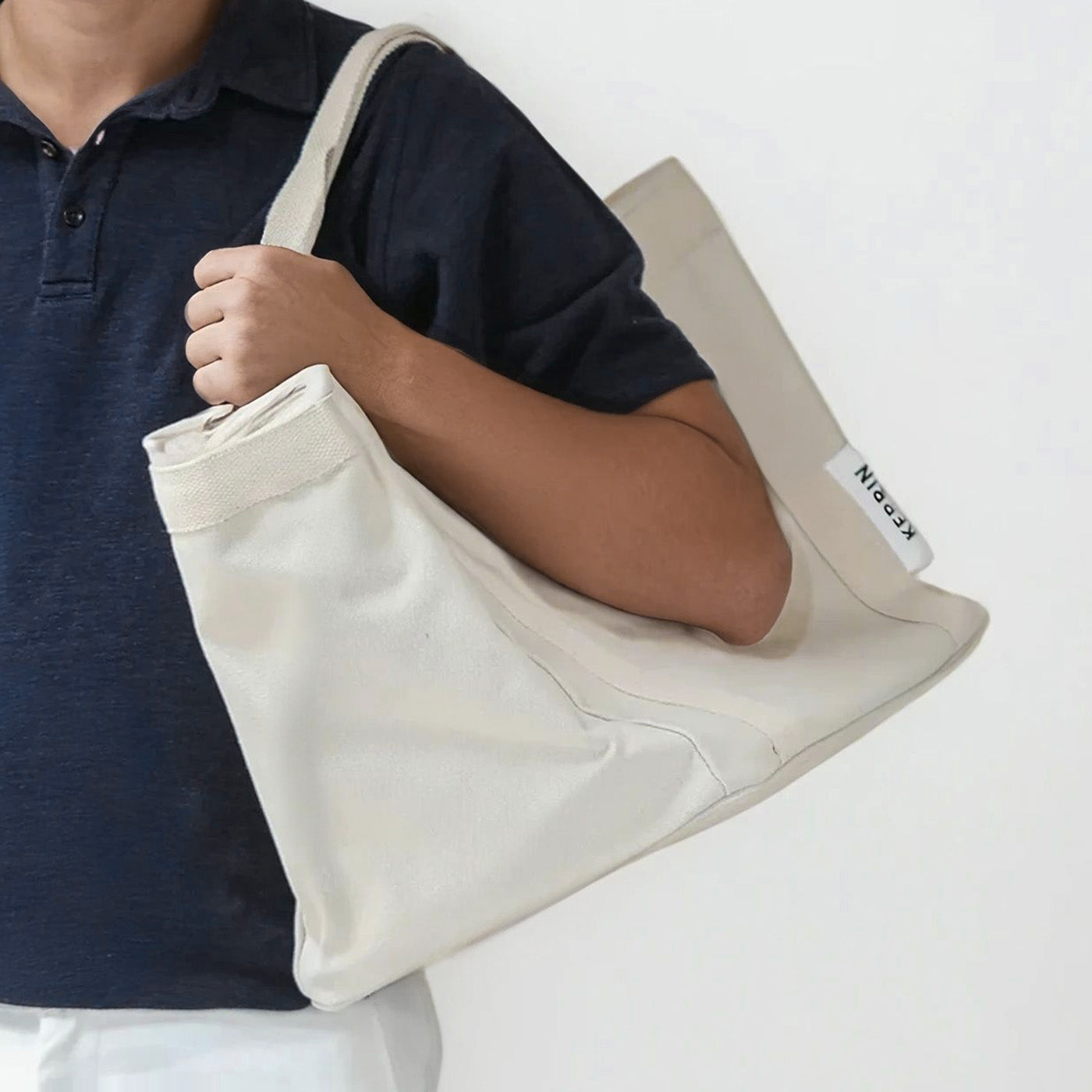 Kerrin Big Beach Tote being carried on shoulder, demonstrating comfortable fit and practical size
