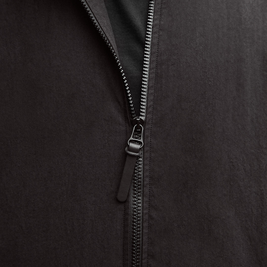 Custom zip detail with leather puller on Kerrin Breezebreaker jacket in Vintage Black