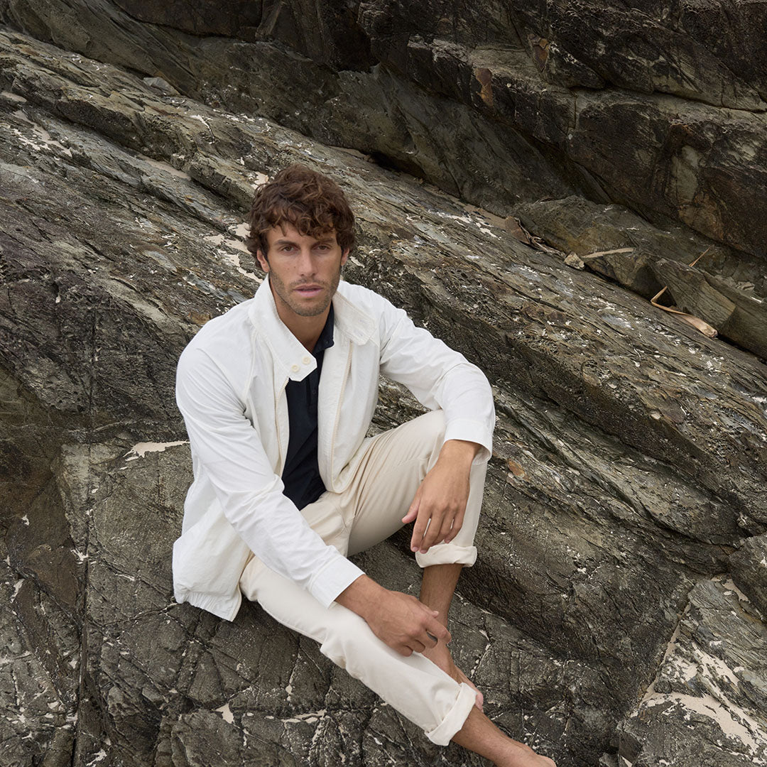 Model wearing Kerrin Breezebreaker jacket in white, showing standard fit